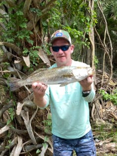 Happy Angler holding catch