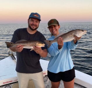 Happy couple at sunset